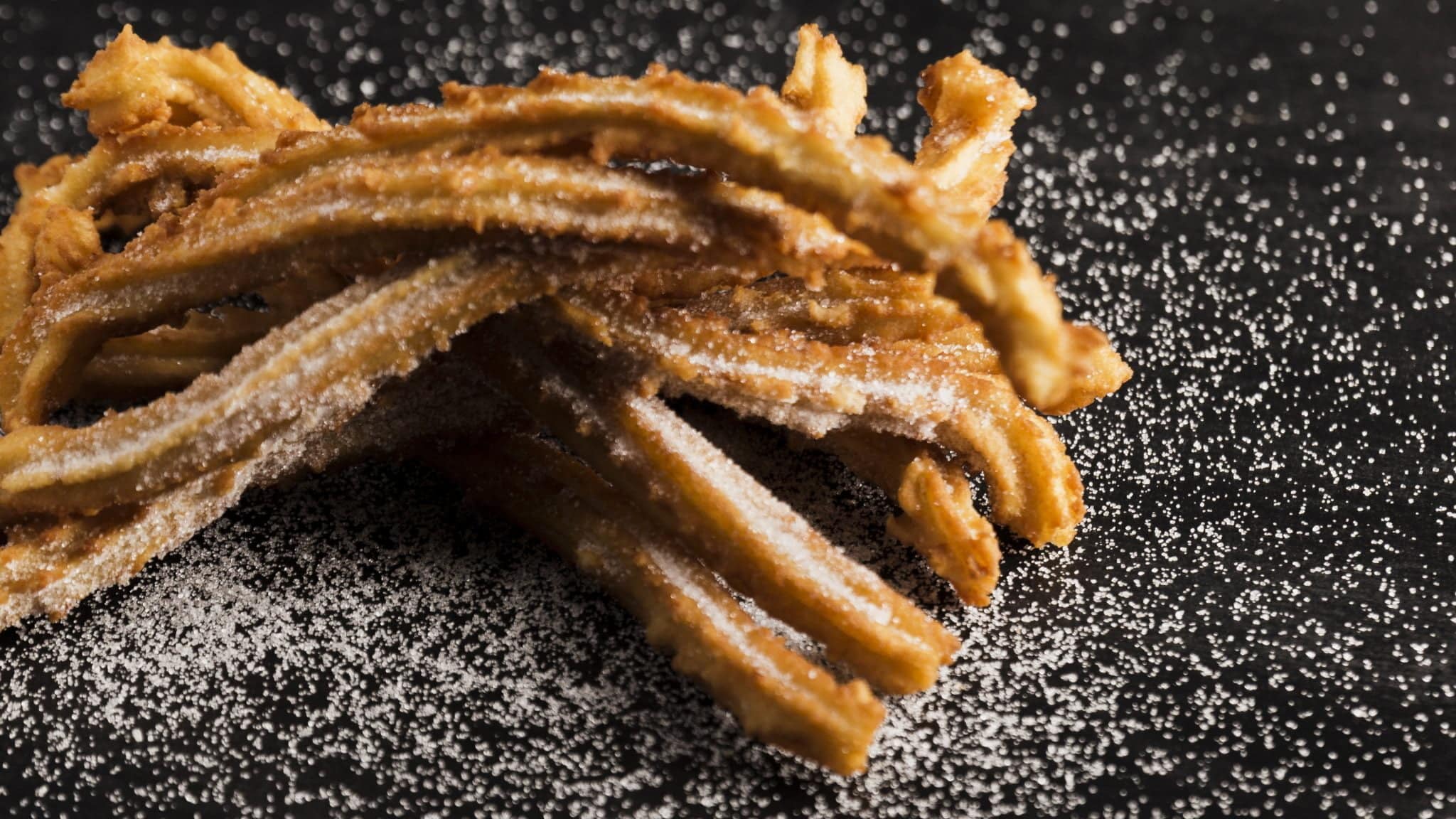 Delicious Fried Churros With Sugar High View Scaled
