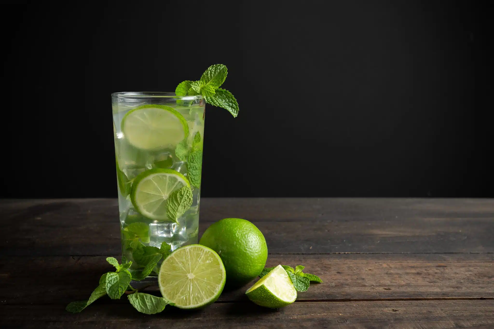 Mojito Drink With Lime Lemon And Mint On Wood Table 1 Scaled